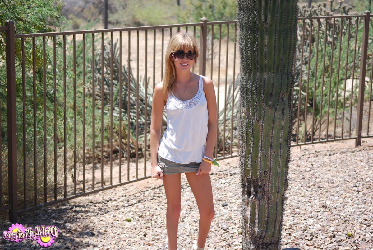 16P Tiny teen with freckles outdoors
