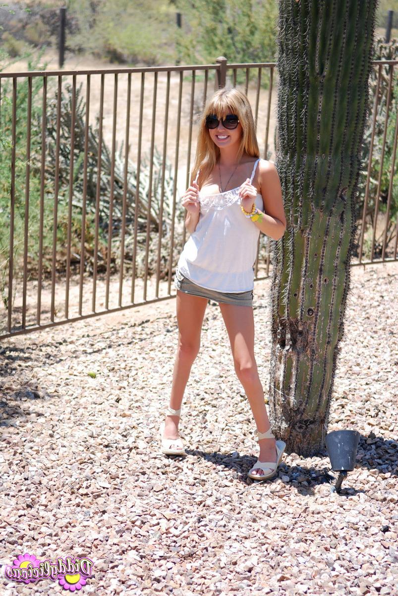 16P Tiny teen with freckles outdoors