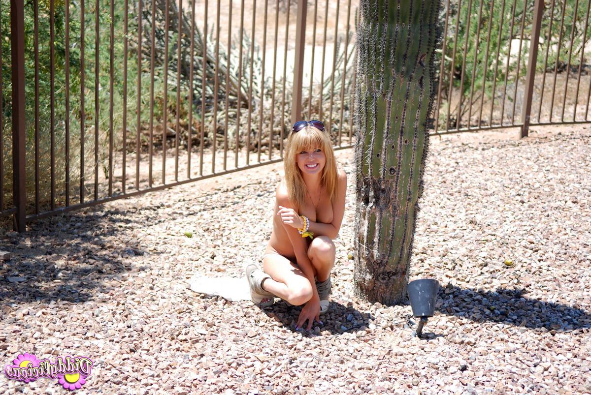 16P Tiny teen with freckles outdoors