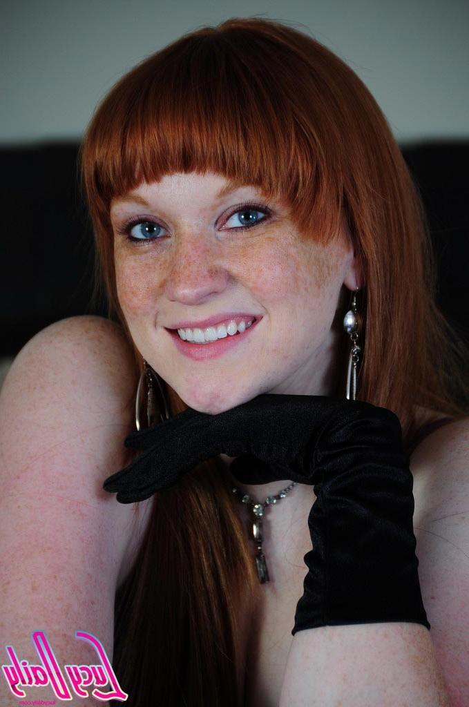 16P Pale redhead girl in lingerie