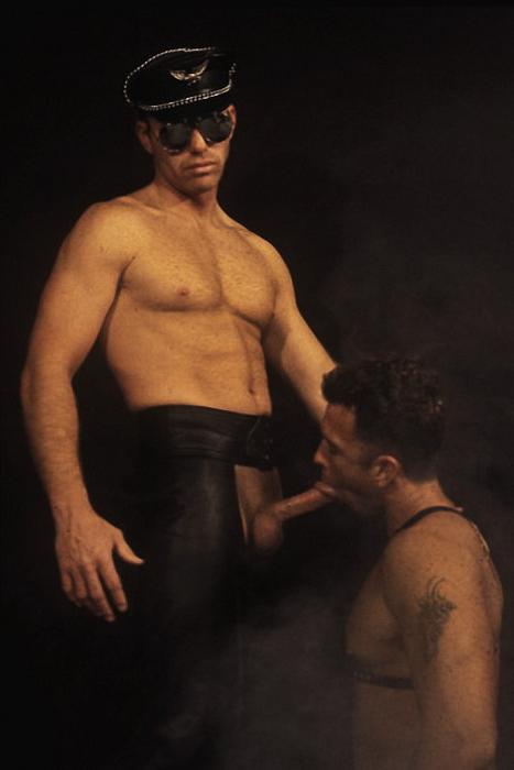 20P Two mature hunks in leather blowjob and screwing in a dungeon