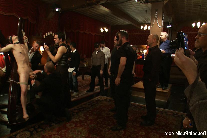 15P Partygoers beat and skull fuck a big dick stud in bondage.