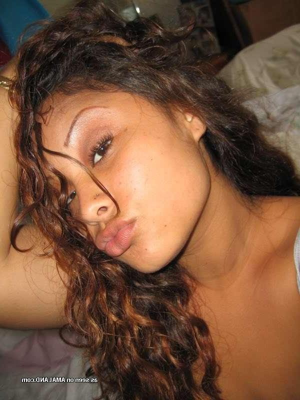 14P Hot Latina bombshell shows off her curves and big round tits