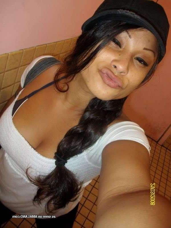14P Hot Latina bombshell shows off her curves and big round tits