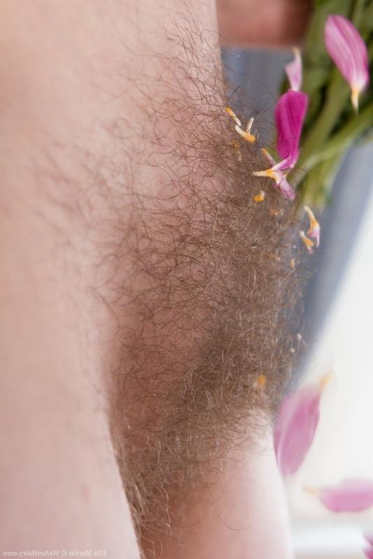 16P Ella Martin enjoys flowers in her bedroom naked