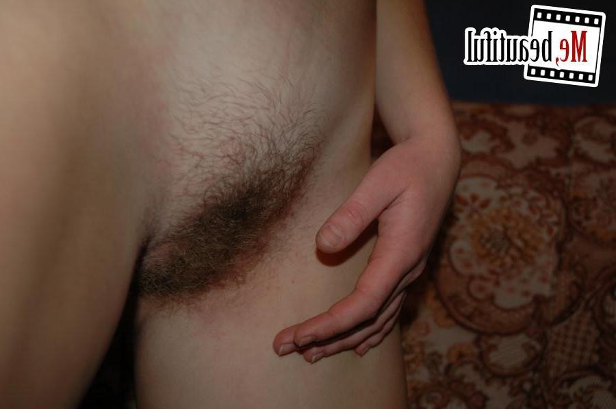 15P Big-titted porn novice takes some close-up shots of her hairy pussy