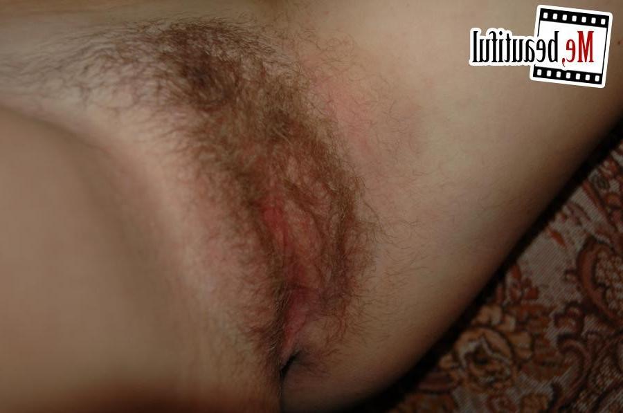 15P Big-titted porn novice takes some close-up shots of her hairy pussy