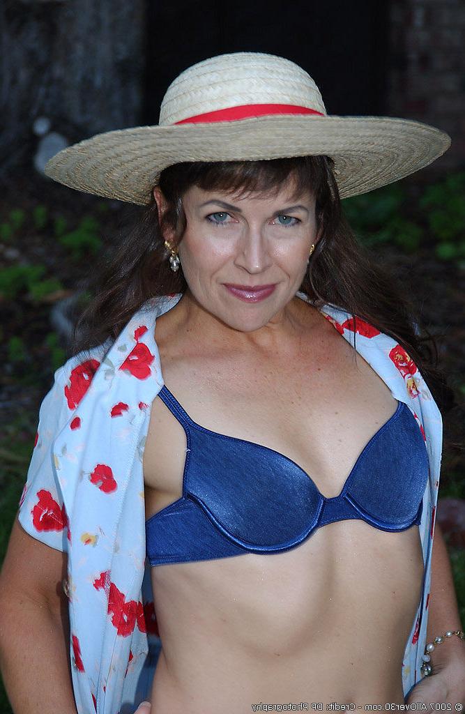 16P Muscular MILF displays her hairy pussy at the park