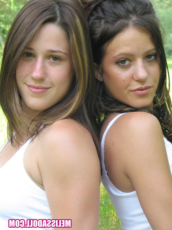 15P two beautiful teens having fun in the park