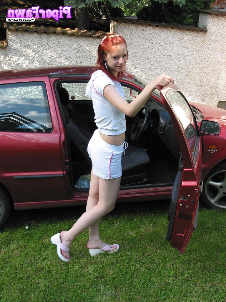 16P Busty redhead teen outside showing her car