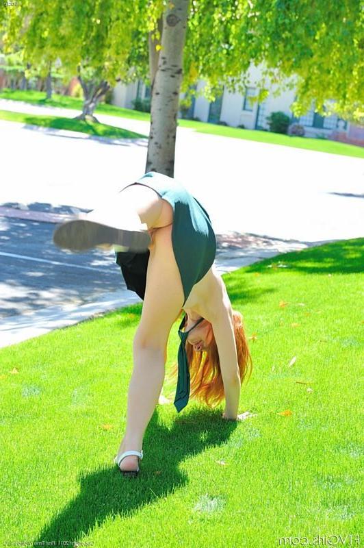 15P Fresh redhead teen dressed as schoolgirl in the park