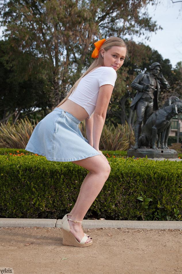 12P Get a peek up this cute girls short skirt at the park