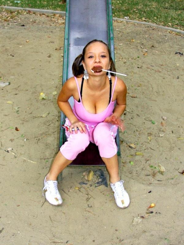 12P Cute Paris Milan playing outdoors on a playground