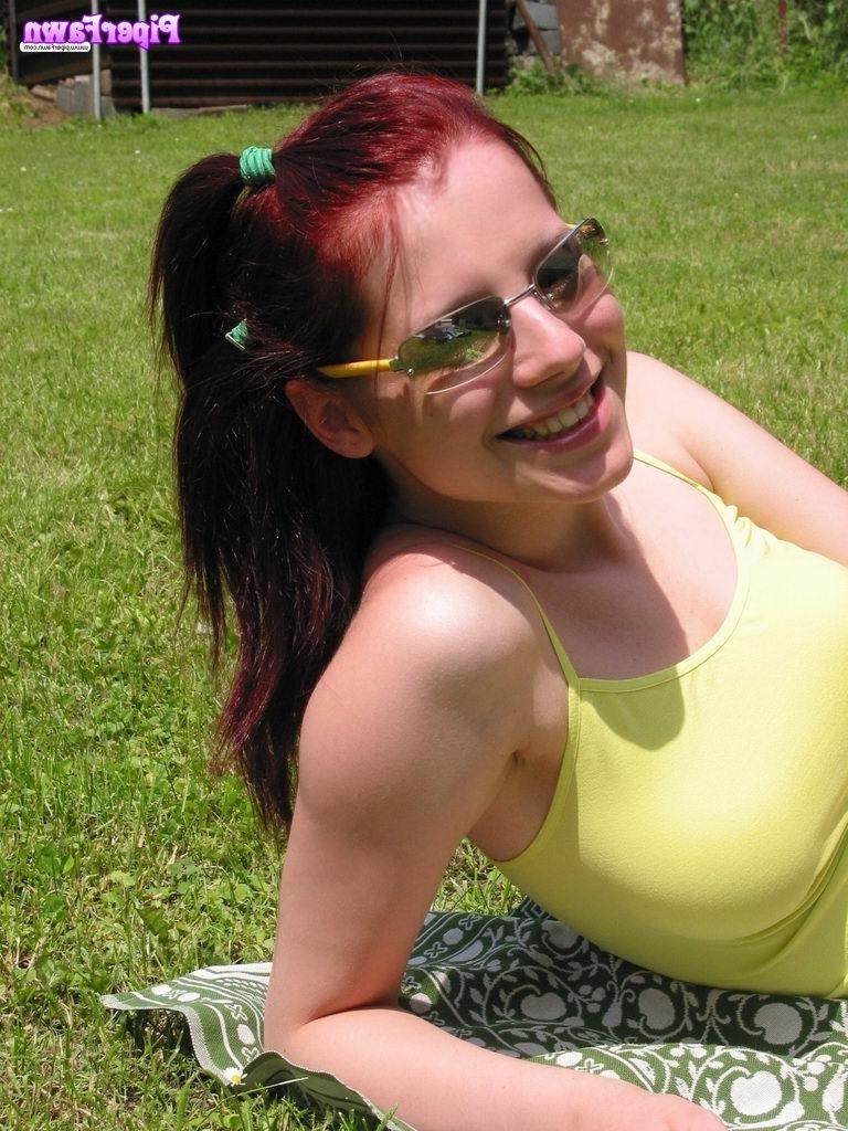 16P Busty redhead teen wearing sunglasses outdoors