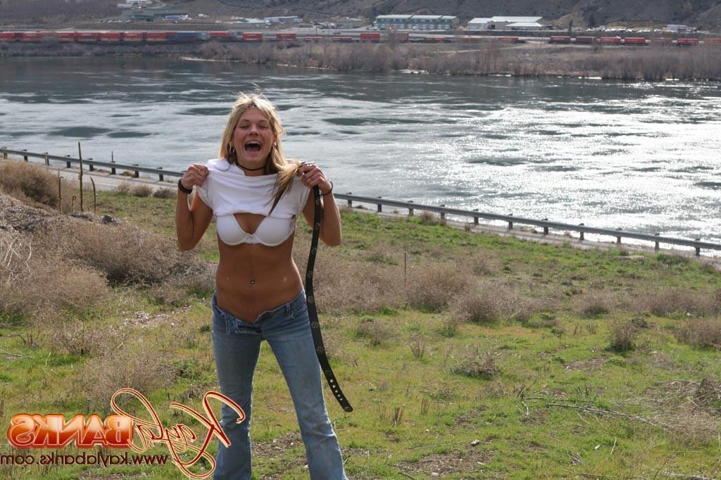 16P Teen blonde flashes a little bit in a public park