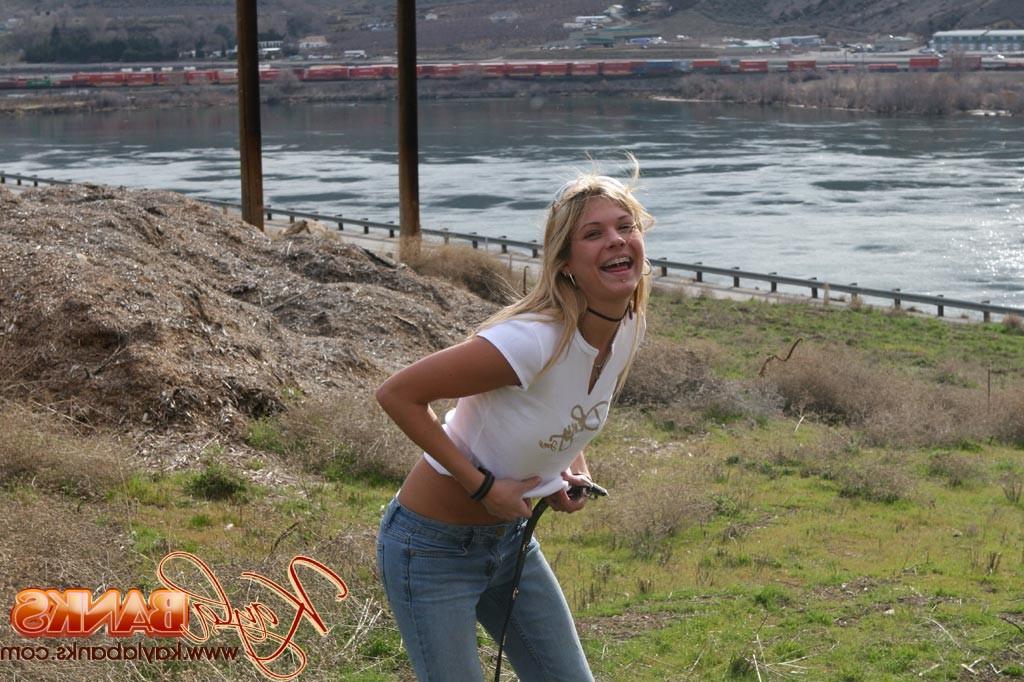 16P Teen blonde flashes a little bit in a public park