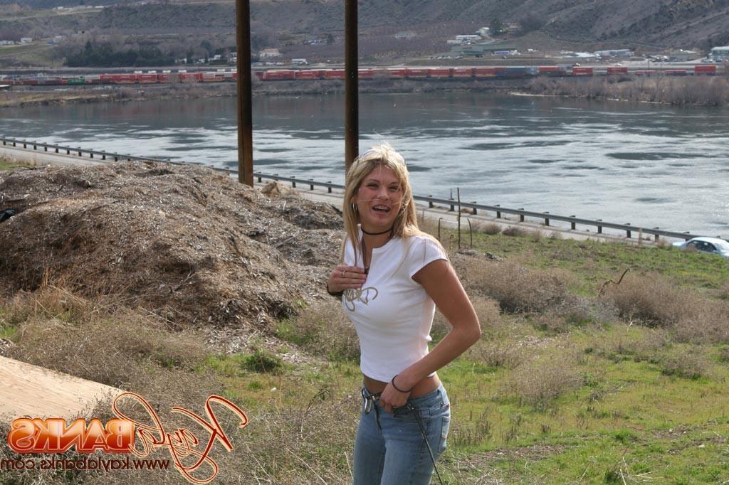 16P Teen blonde flashes a little bit in a public park