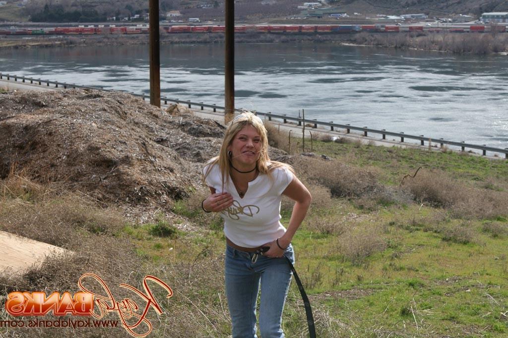 16P Teen blonde flashes a little bit in a public park