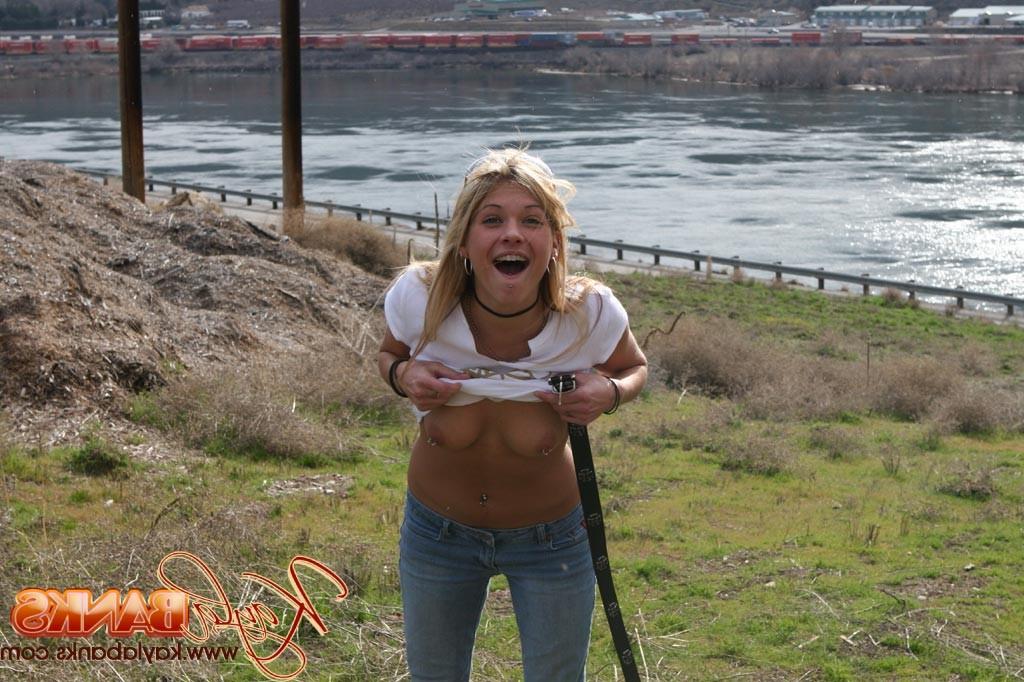 16P Teen blonde flashes a little bit in a public park