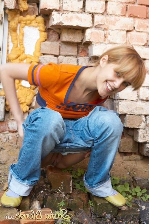 17P Young stunning naughty blonde cutie posing and peeing outdoors