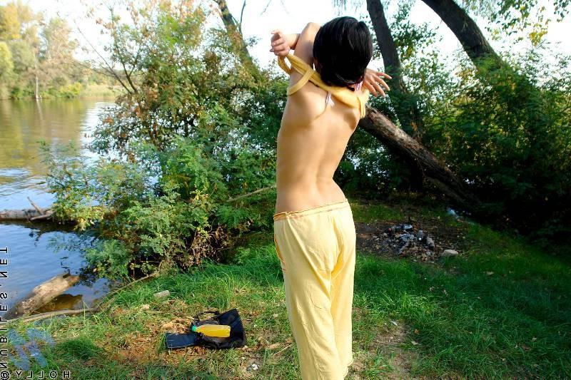 20P Petite brunette babe in park and strips naked