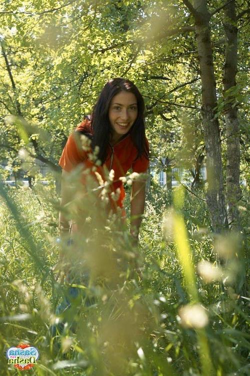 17P Young stunning brunette angel peeing in the woods outdoors
