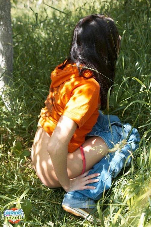 17P Young stunning brunette angel peeing in the woods outdoors