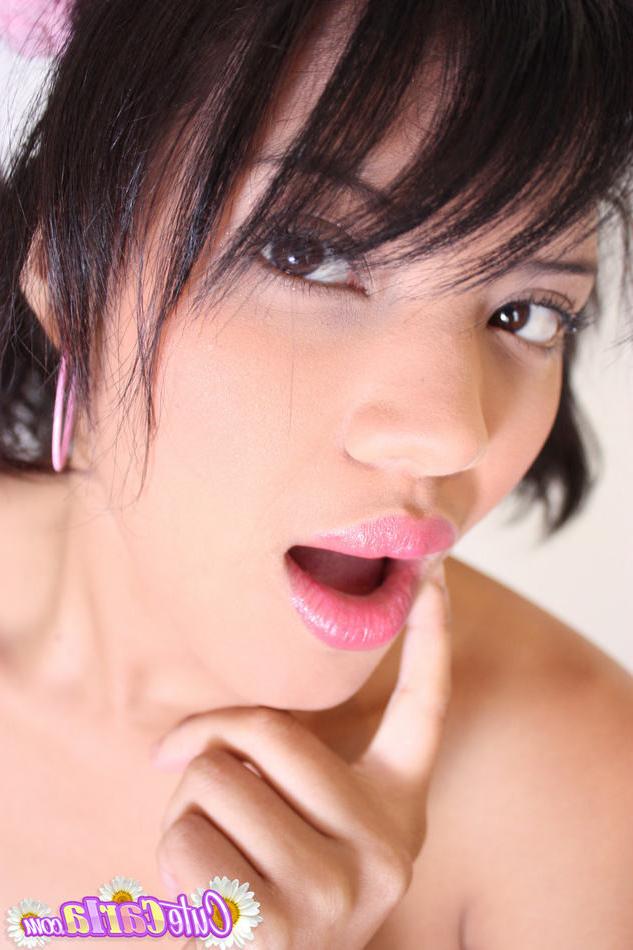 15P Tiny titted 18 year old Latina slips off thong panties to pose