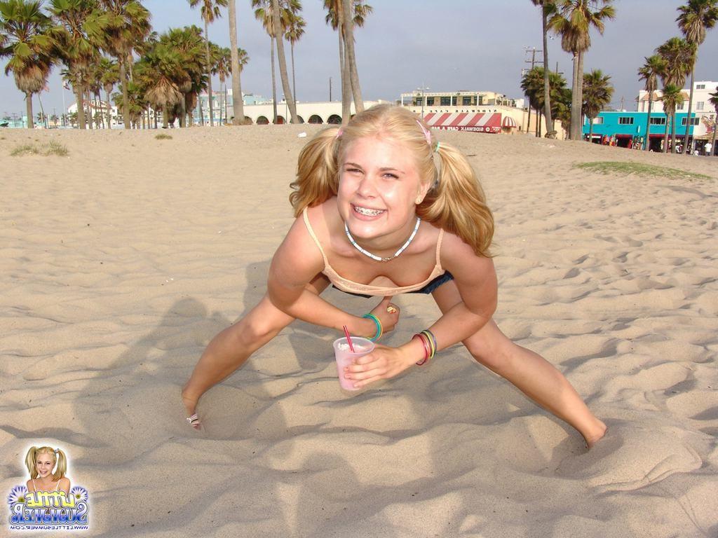 15P Eighteen year old shows panties and tits on beach