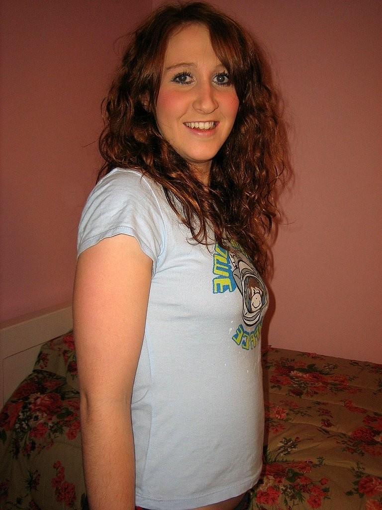 15P Amateur readhead in panties shows off her tiny boobs