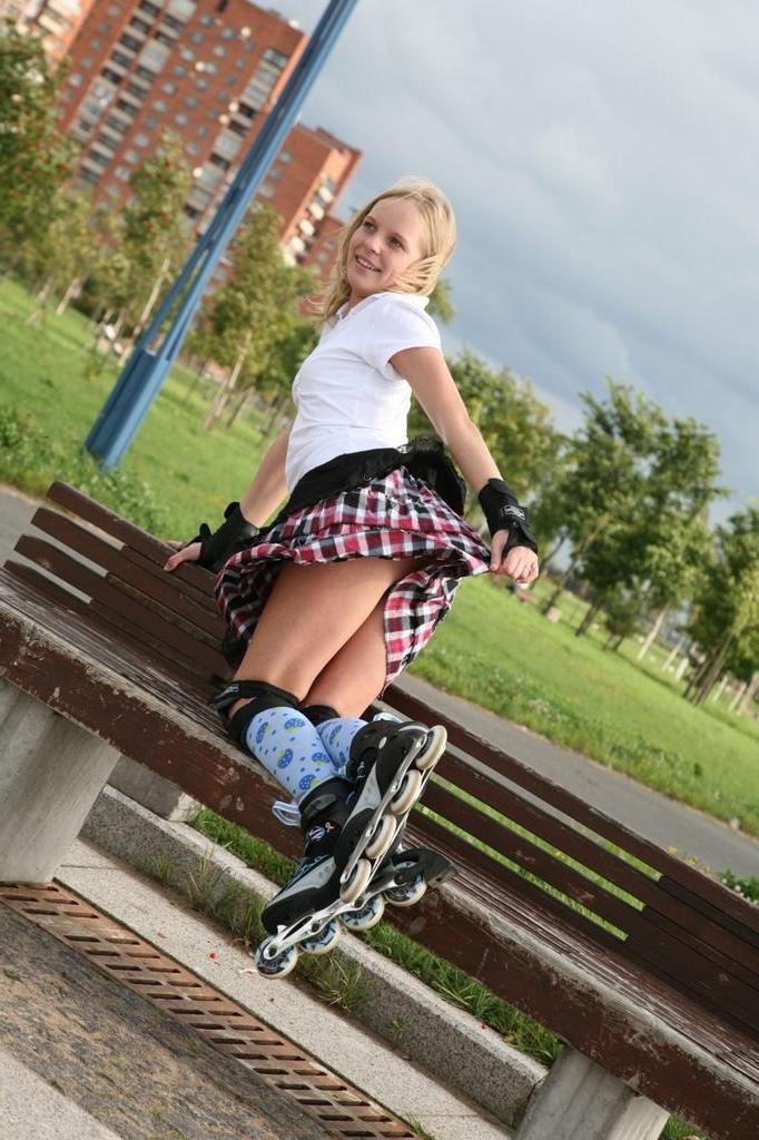 15P Teen spreads pussy in the park on rollerblades