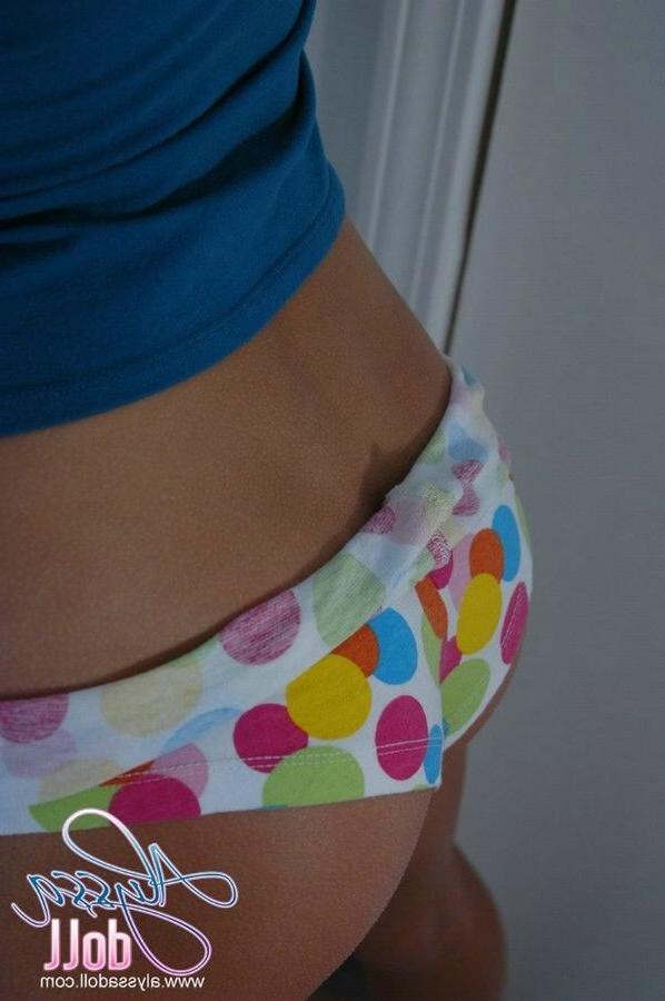 15P Cute Alyssa posing in colorful panties and blue top