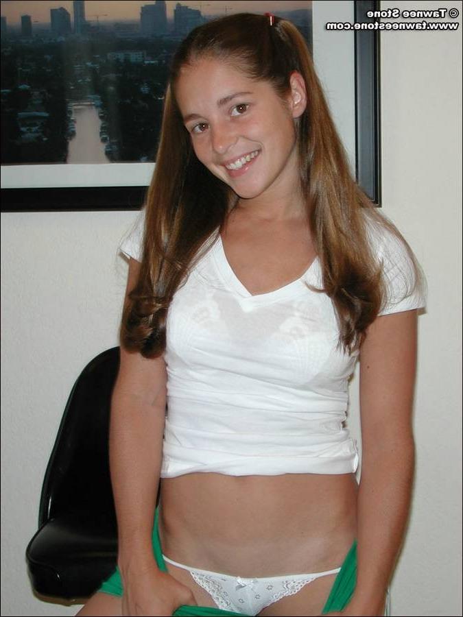 15P Young brunette takes off her panties and spreads her legs