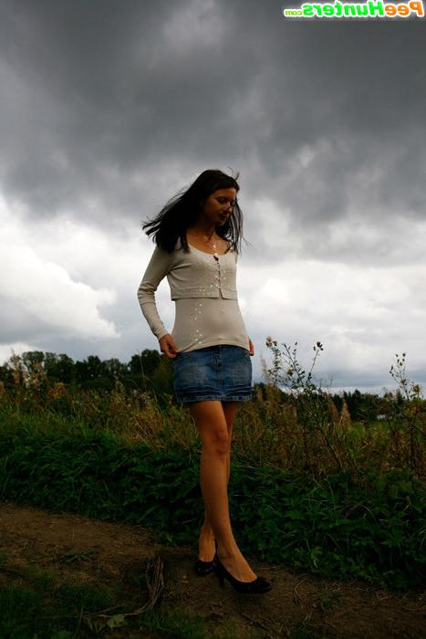 16P Babe tinkles on a road in the middle of a field
