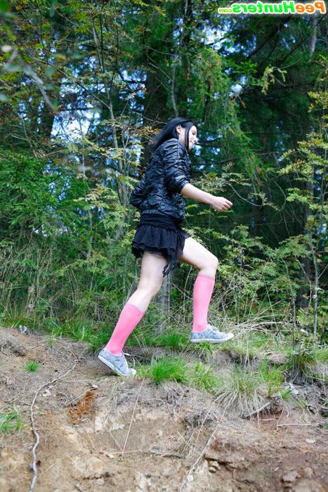 16P Naughty brunette tart takes a leak in the woods