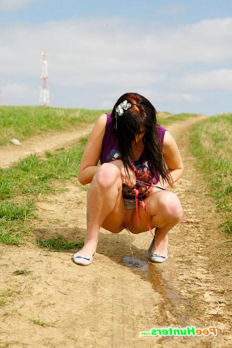 16P Naughty babe stains dirt road with her smelly piss