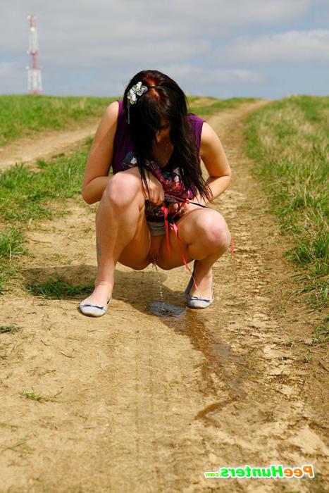 16P Naughty babe stains dirt road with her smelly piss