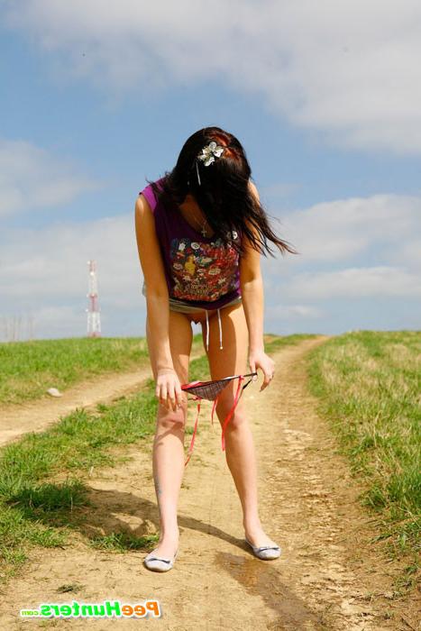 16P Naughty babe stains dirt road with her smelly piss