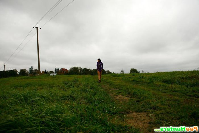16P Girl pulls the hem of her dress up to pee outdoors