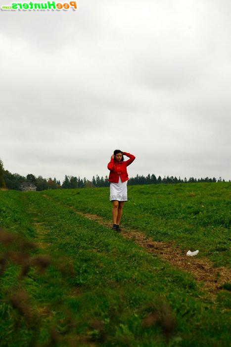16P Girlie feeling cold takes a quick leak on a field