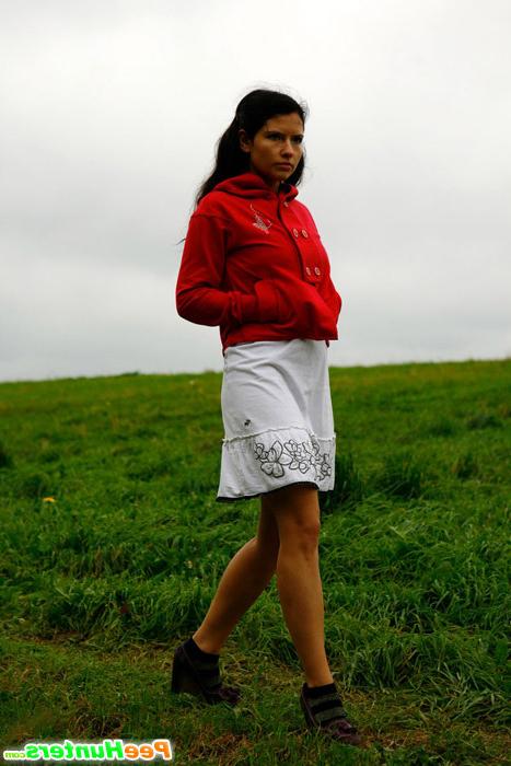 16P Girlie feeling cold takes a quick leak on a field
