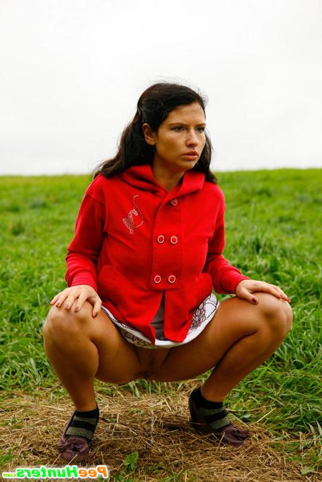 16P Girlie feeling cold takes a quick leak on a field