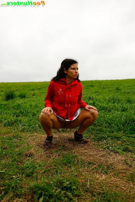 16P Girlie feeling cold takes a quick leak on a field