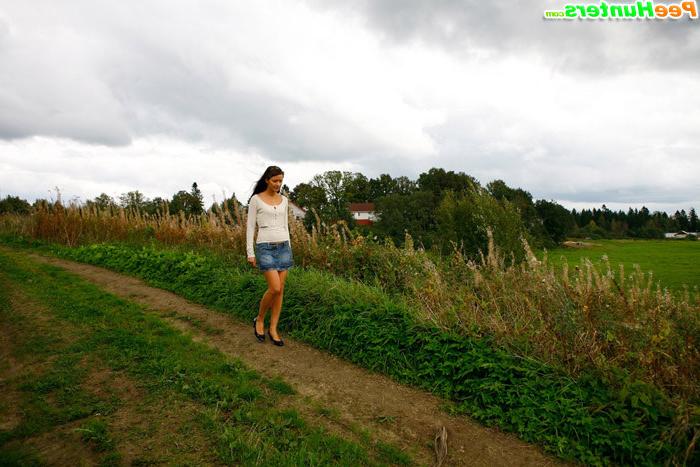 16P Cute brunette babe pisses up a storm in the field
