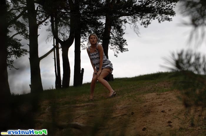 16P Cute babe goes out commando and pisses in the woods