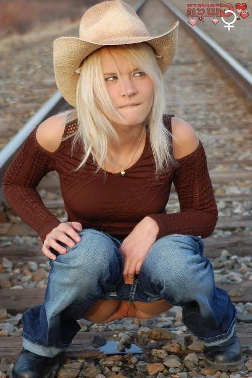 15P Little cowgirl drops her pants and pisses on the tracks