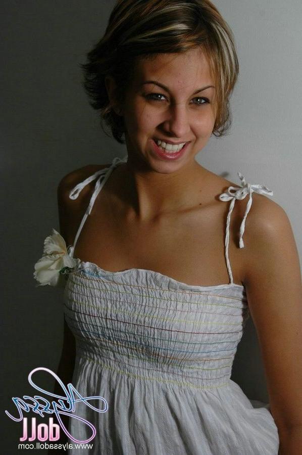 15P Cute Alyssa posing and teasing in a white baby doll dress
