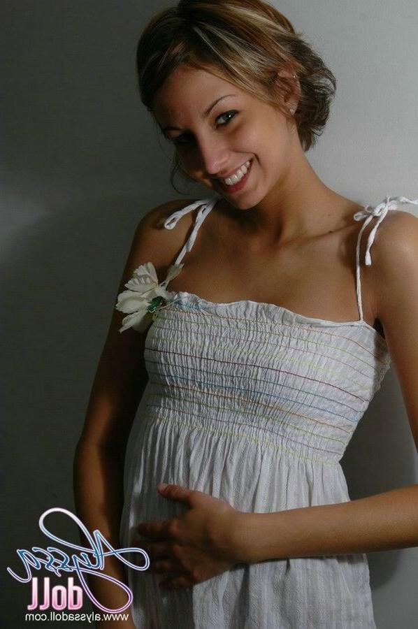 15P Cute Alyssa posing and teasing in a white baby doll dress