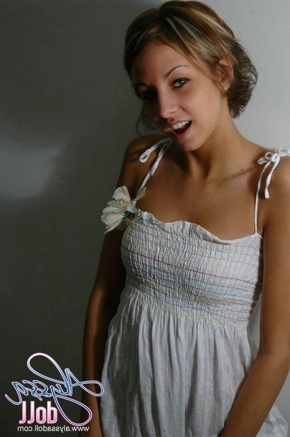 15P Cute Alyssa posing and teasing in a white baby doll dress