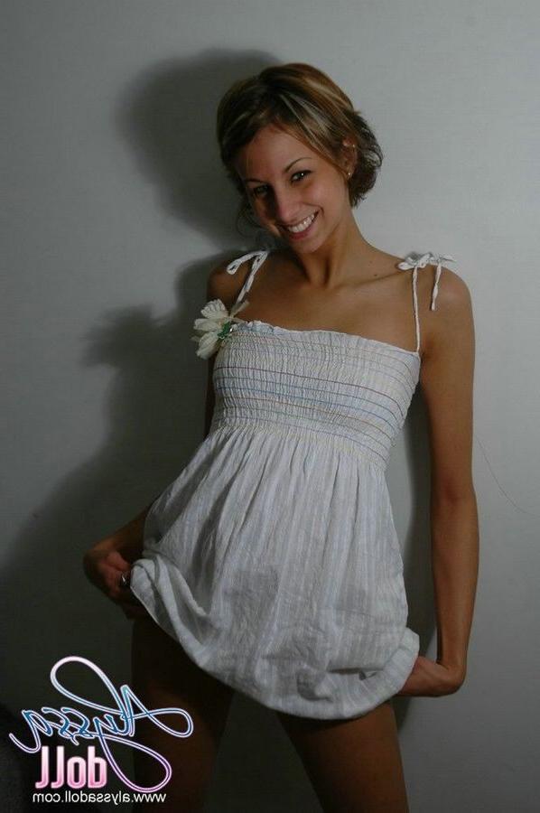 15P Cute Alyssa posing and teasing in a white baby doll dress